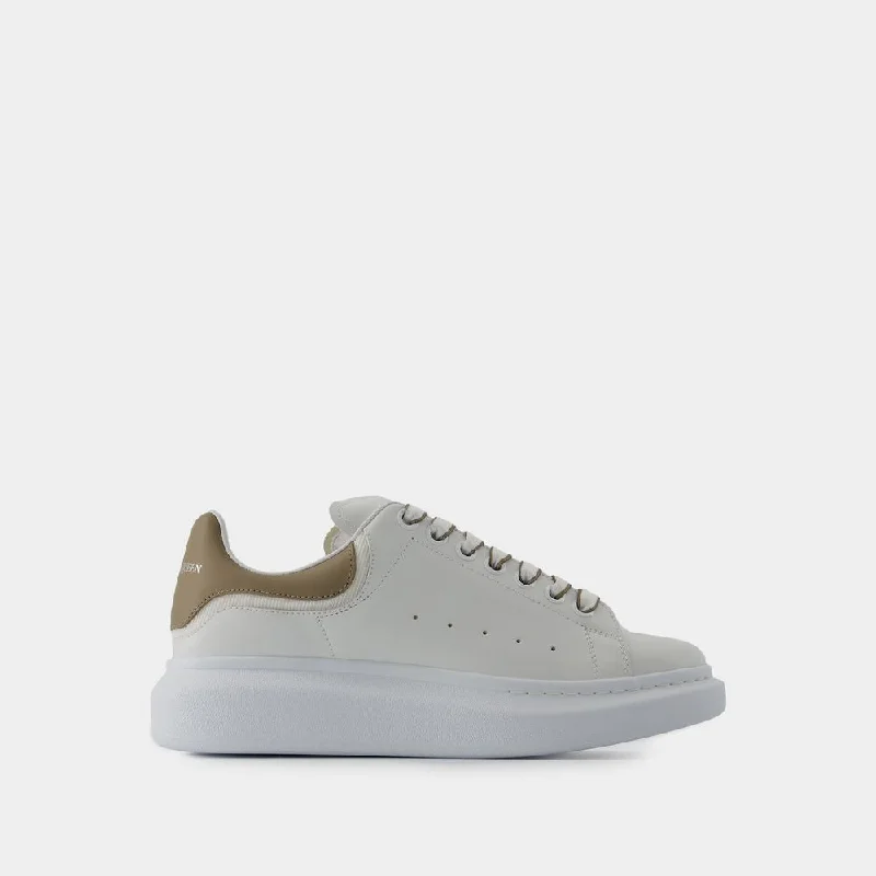 Athletic shoes with supportive soles -ALEXANDER MCQUEEN Oversized Sneakers for Men - FW24