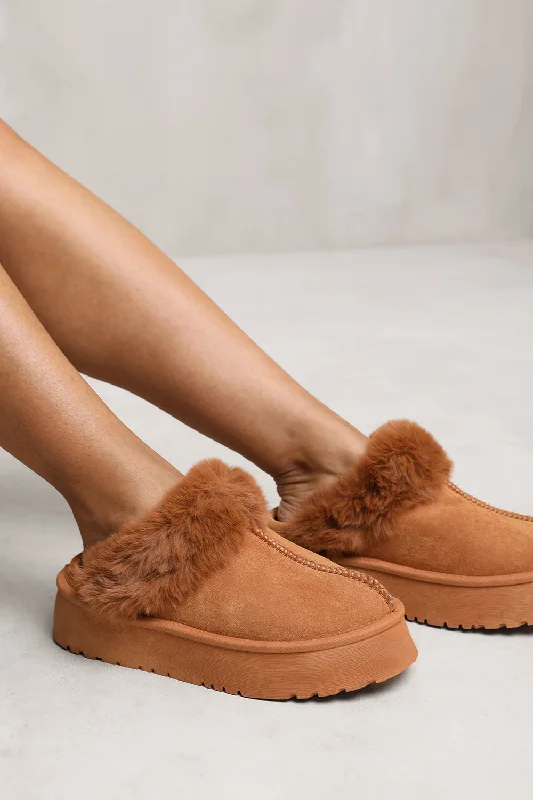 Slippers with bright tones -MAYA SLIDE ON SLIPPER WITH FAUX FUR LINING IN CAMEL